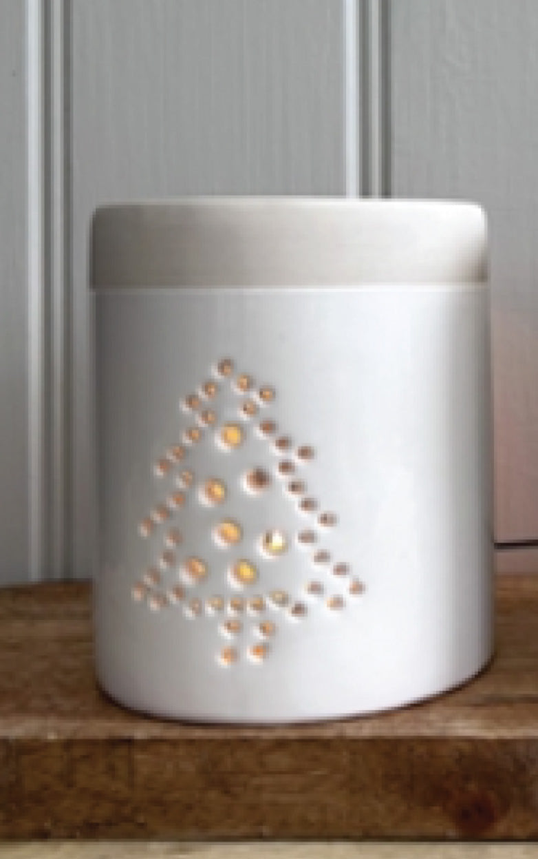 Christmas Ceramic Burner for Oil & Wax Melts with a Cut-away Tree Design.